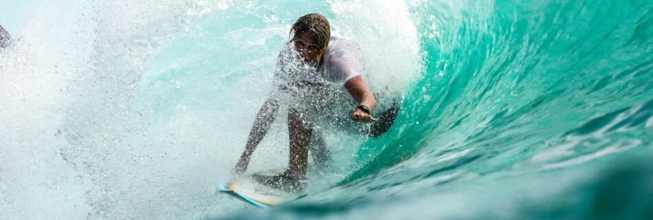time lapse photography surfer in wave water